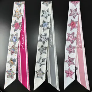 Three elegant Twilly-style floral scarves with France text on a black background