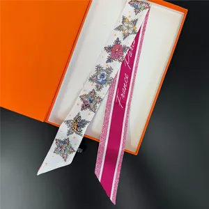 Floral tarot silk twilly scarf with France Paris lettering in an orange luxury gift box