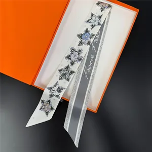 Pentagram ribbon silk twilly with purple floral print and luxury orange gift box