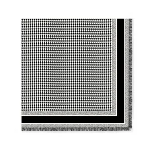 Classic black and white houndstooth square scarf with elegant fringed edges for women