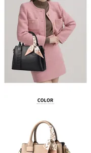 Detail of elegant tote bags with lychee grain leather and silk scarf handle decoration