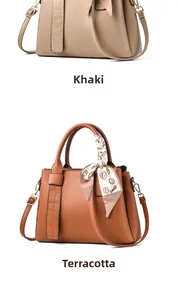 Detail view of khaki and tan leather handbags with silk scarves and litchi texture