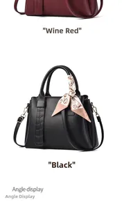 Close-up of wine red and black litchi pattern leather handbags with silk scarf detail