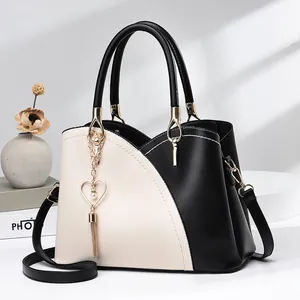 Borsa a Mano da Donna in Pelle PU a Blocchi di Colore Ciondolo a Cuore con Nappina Borsa a Tracolla Elegante per Ufficio Quotidiano