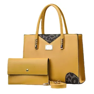 Bright yellow leopard print tote bag set with matching wallet and golden hardware details
