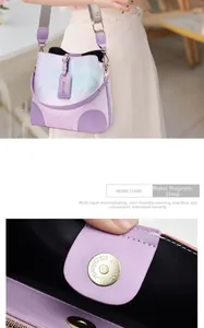 Detail of multi-layer plated magnetic buckle on gradient purple daisy bucket bag