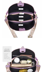 Detail view of purple crossbody bag interior with multiple compartments and large capacity