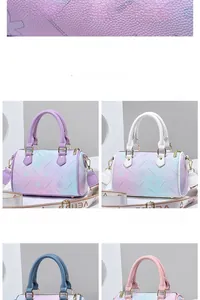 Macro shot of gradient taro purple boston bag with floral patterns and gold hardware