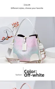 Detailed macro view of the gradient pastel bucket bag with soft floral embossed texture