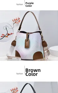 Close-up of gradient bucket bags in purple and brown with floral patterns and straps