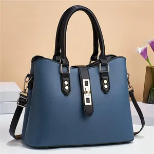 Blue lychee pattern leather tote bag with black handles and gold clasp hardware