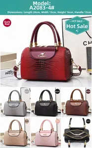 Detail view of crocodile pattern leather bucket bag interior and six available color options