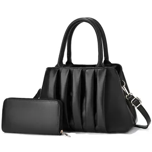 Chic black pleated hobo bag and matching zipper wallet set with cylindrical handles