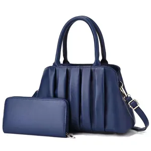 Navy blue ruched tote bag with matching long zipper wallet set and gold hardware details