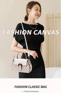 Detail of printed canvas handbag with elegant floral patterns and wood texture buckle