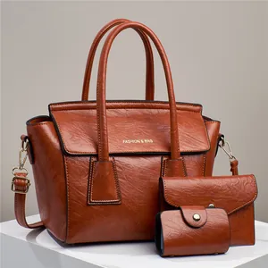 Set di borse da donna 3 pezzi in ecopelle marrone con borsa tote e due pochette