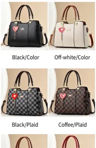 Detail of luxury textured handbags featuring checkered patterns and heart charms
