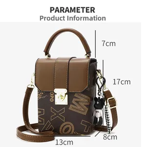 Detailed view of small crossbody phone bag with size specs 13x17x8cm and brown pattern