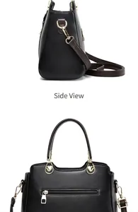 Side view of black lychee grain leather handbag with gold heart hardware and zipper pocket