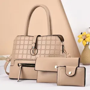 Chic three-piece women's nude handbag set with elegant quilted texture and gold hardware