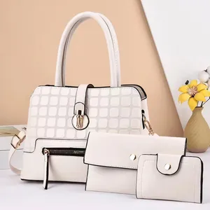 Three-piece beige faux leather tote bag set with quilted texture and gold hardware