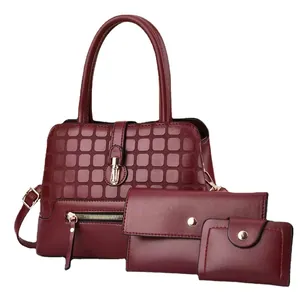 Three-piece burgundy leather handbag set with quilted patterns and matching wallets