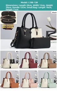 Detail view of large capacity color-block handbag with matching purse and interior compartments
