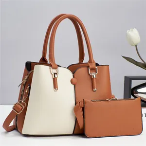 Detail of two-piece tote bag set with brown and beige color block and pebble texture