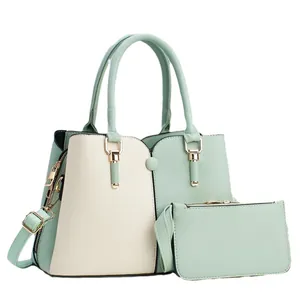 Two-piece set with large tote and pouch in light green and beige contrast leather