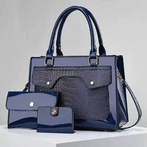 Ensemble de 3 sacs bleu foncé en cuir verni brillant avec détails texture crocodile