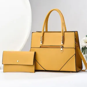 Ginger yellow PU leather tote bag and wallet set featuring V-shaped stitching detail