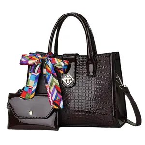 Deep burgundy croc-effect leather handbag set with silk scarf and metallic lock