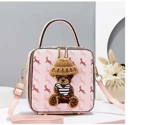 Pink box bag with deer print, 3D teddy bear patch, and adjustable shoulder strap