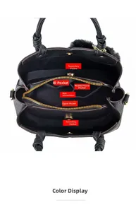 Top view of black tote bag interior showing multiple functional compartments and pockets