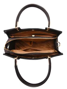 Vue de dessus de l'intérieur du sac noir effet crocodile avec fermetures éclair dorées