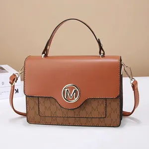 Classic brown and dark coffee crossbody bag with letter print and golden M buckle