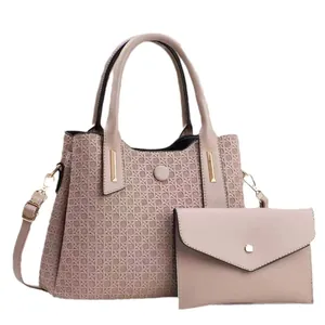 Elegant beige embossed handbag and envelope clutch set with detachable shoulder strap