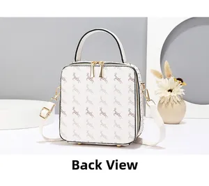 Back view of a square crossbody bag with deer print and gold rivet trim details