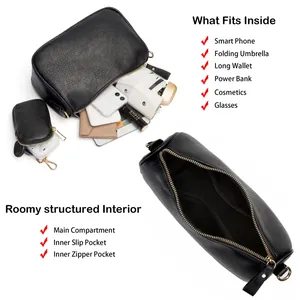 Interior view of black litchi leather saddle bag with pockets showing storage capacity