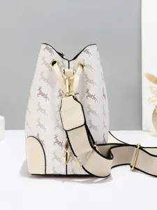 Fashion bucket bag with brown deer print and beige wide shoulder strap in a stylish view
