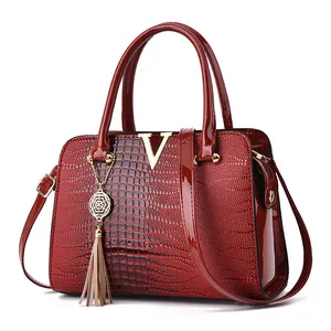 Elegant dark red crocodile pattern tote bag with gold V-metal decor and top handles