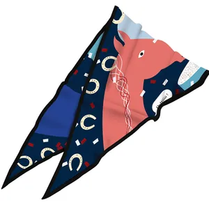 Detail of Twilly silk scarf showing horse head pattern and colorful graphic design