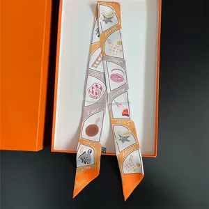 Summer silk twilly scarf with orange cartoon patterns in a premium presentation box