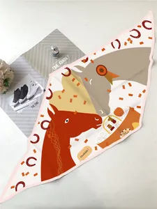 Close-up of heart and horse print silk-feel diamond scarf with pink rolled edges