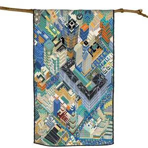 Paris city architecture printed scarf displayed on a wooden branch over white background