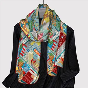 Paris architecture print twill scarf with vibrant geometric patterns on a black knit top