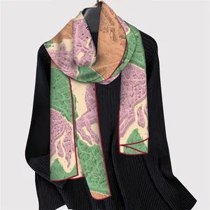 Summer silk scarf with vintage city map print and red rolled edges on a black hanger