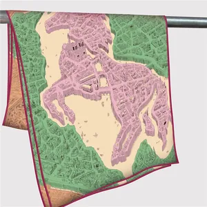Detail of hand-rolled edges on a silk scarf with artistic city map horse design