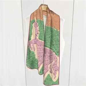 Detail of hand-rolled edges on a vintage map print silk scarf with colorful block design