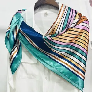 French style 90cm silk-like scarf with colorful geometric stripes on a white shirt
